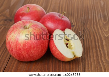 gala apples on wood table, rustic style