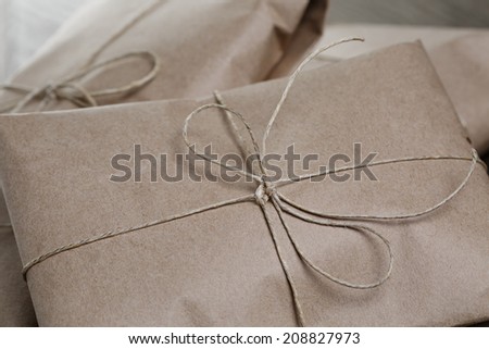 vintage style parcels wrapped with rope, close up photo
