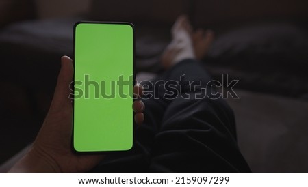 Similar – Image, Stock Photo Man lying down holding mirror with reflection