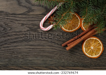 christmas decorations on old oak table, rustic background