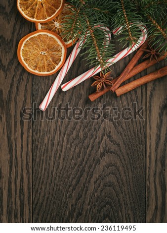 rustic christmas decorations on old oak table, vintage toned