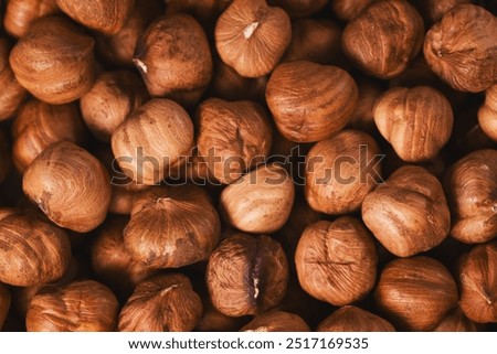 Similar – Image, Stock Photo Brown ripe hazelnut on spoon at table