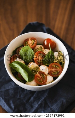 Similar – Foto Bild Caprese-Salat auf braunem Hintergrund