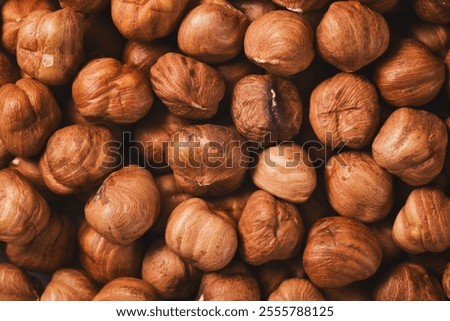 Similar – Image, Stock Photo Brown ripe hazelnut on spoon at table