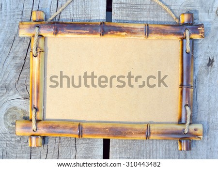 Bamboo frame  on the village background