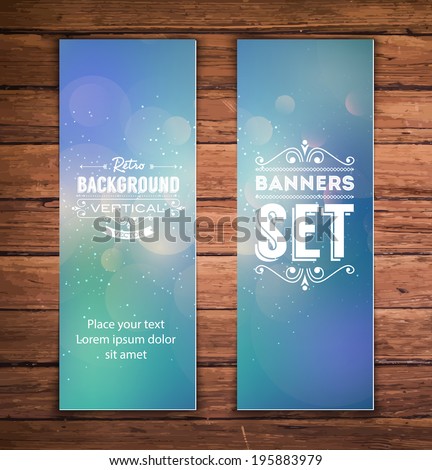 Vector vertical banners with blue blurry glittering bokeh background