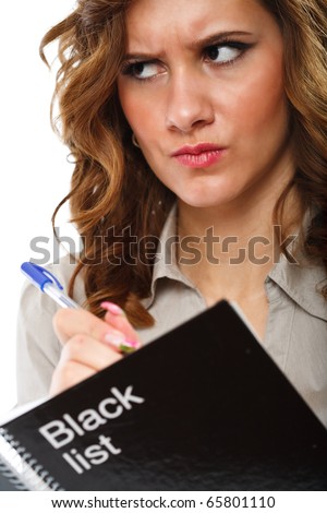 Angry businesswoman writing names in a \
