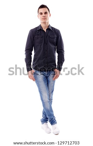 Casual Young Man Standing With His Legs Crossed, In Full Length Pose ...