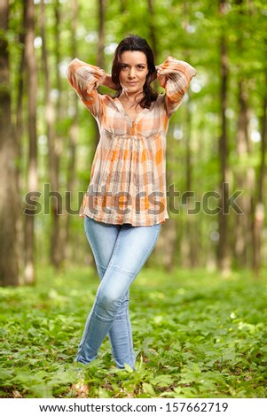 Portrait of beautiful woman in a forest