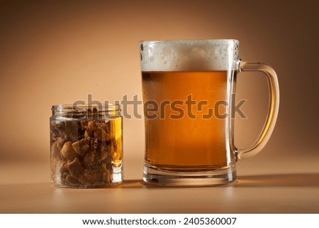 Similar – Image, Stock Photo Brown glass jar near fir branches and pine cones on dark green top view. Brand packaging mockup.