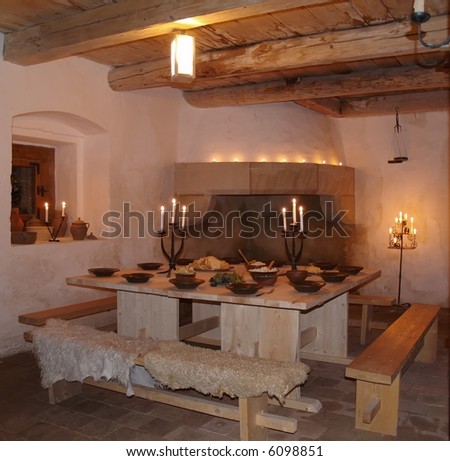 historic room with candles and food