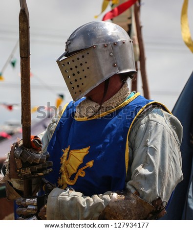 Medieval Warrior with a great helmet and cool glove.