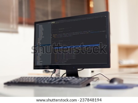 web site source codes on computer monitor.