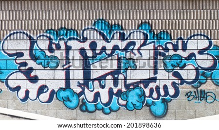 SLOVAKIA, RUZOMBEROK - JUNE 28 2014: Clouds graffiti on a legal wall in public skatepark