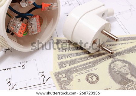 Copper wire connections in electrical box, electric plug and money on construction drawing of house, concept for engineering and energy savings