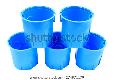 Stack of blue plastic electrical boxes on white background, junction boxes, accessories for engineering jobs