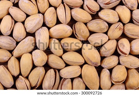 Roasted pistachio nuts as background, healthy food and nutrition