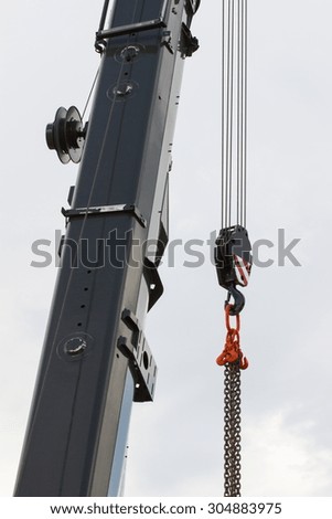 Part of crane truck with hook and chain for construction, technology, part of machinery