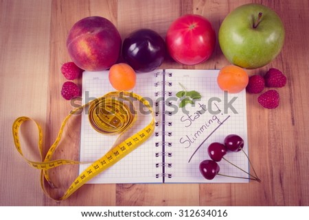 Vintage photo, Fresh fruits and vegetables with tape measure and notebook for writing notes, concept of slimming, diet and healthy nutrition