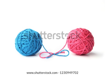 Two pink and blue cotton thread balls tied in bow isolated on white background.  Different color pink and blue thread balls. 
 Stock foto © 