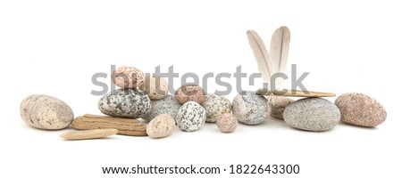 Image, Stock Photo Pebbles and feathers on table