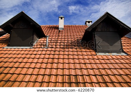 Red Roof of a brick house
