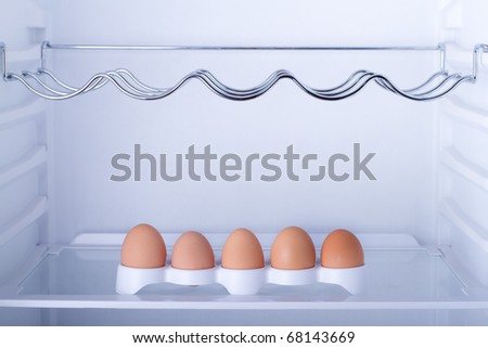 Inside the fridge are five eggs