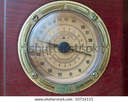 Old fashioned red wood radio dial in metallic frame