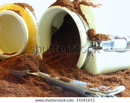 can,spoon and spilled ground coffee