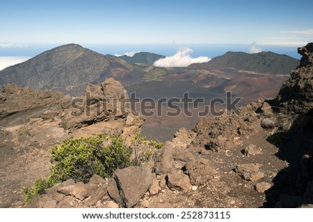 Haleakala National Park in Maui includes an ancient dormant volcano where visitors can hike around the rim or inside the crater.