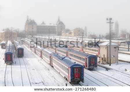 ISTANBUL, TURKEY, JANUARY 1, 2012: Snow and fog on the train parking area of Haydarpasa Train Station, along with Sirkeci Terminal, they are Istanbul\'s two intercity and commuter railway terminals.