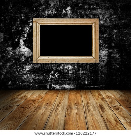 Empty frame in dark grunge room