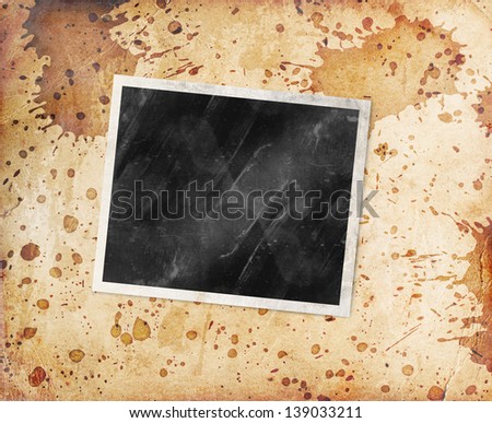 Old photo frame on paper background