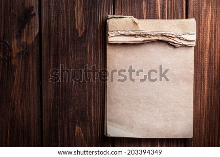 old notebook on wooden background