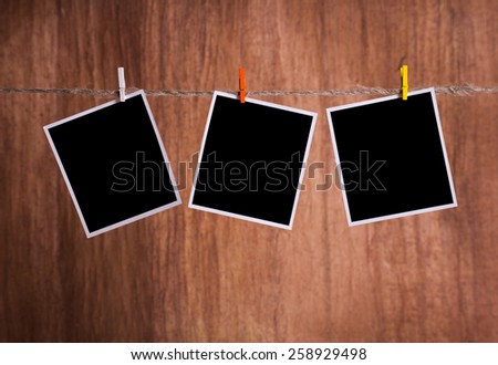 Blank instant photo hanging on the clothesline