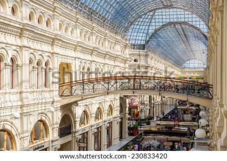MOSCOW - MAY 18: Interior of the Main Universal Store (GUM) on May 18, 2014 in Moscow. GUM is the large 3-story shopping center and great example of Russian architecture by Vladimir Shukhov.