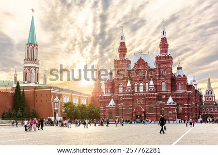 MOSCOW - MAY 16: People walking on the Red Square near Historical museum on May 16, 2014 in Moscow, The State Historical Museum of Russia  wedged between Red Square and Manege Square in Moscow.