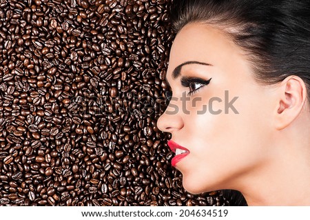 profile of a face of a beautiful woman in coffee beans