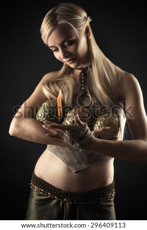 beautiful woman warms fire dragon eggs