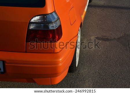 Rear light of a orange city car