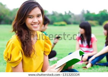 Students hanging out in the park.