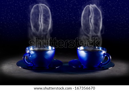 Two coffee cups with steam in the form of coffee beans