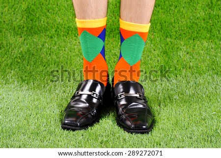 Colorful socks, business shoes