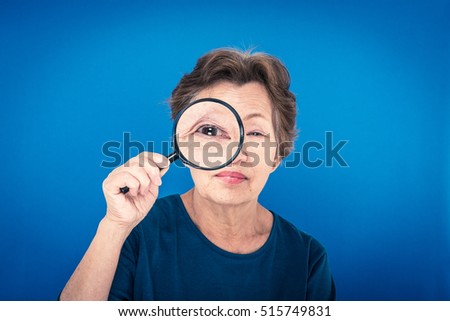 Similar – Image, Stock Photo Senior woman with magnifying glass