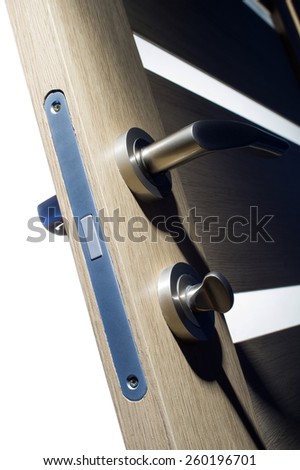 metallic magnetic lock on doors with glass inserts