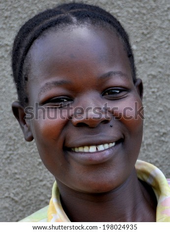 GULU, UGANDA, AFRICA - CIRCA MAY 2009: Portrait of a woman from Uganda, Africa circa May 2009. In Uganda, women\'s roles within the community are slowly improving with increased educational programs.