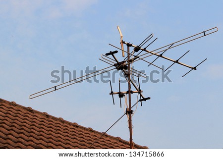 Home TV antennas mounted on a roof