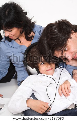 happy family spending time together with teen listening to music