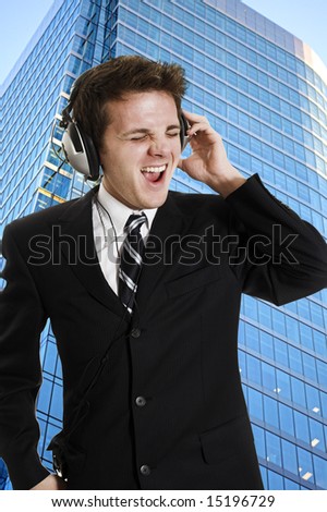 man listening to music over white background