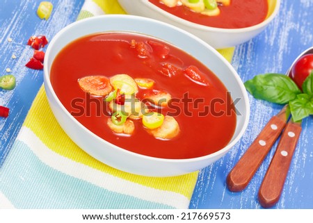 Creamy Tomato Soup. Fresh organic tomato soup in bowl. Macro, selective focus
